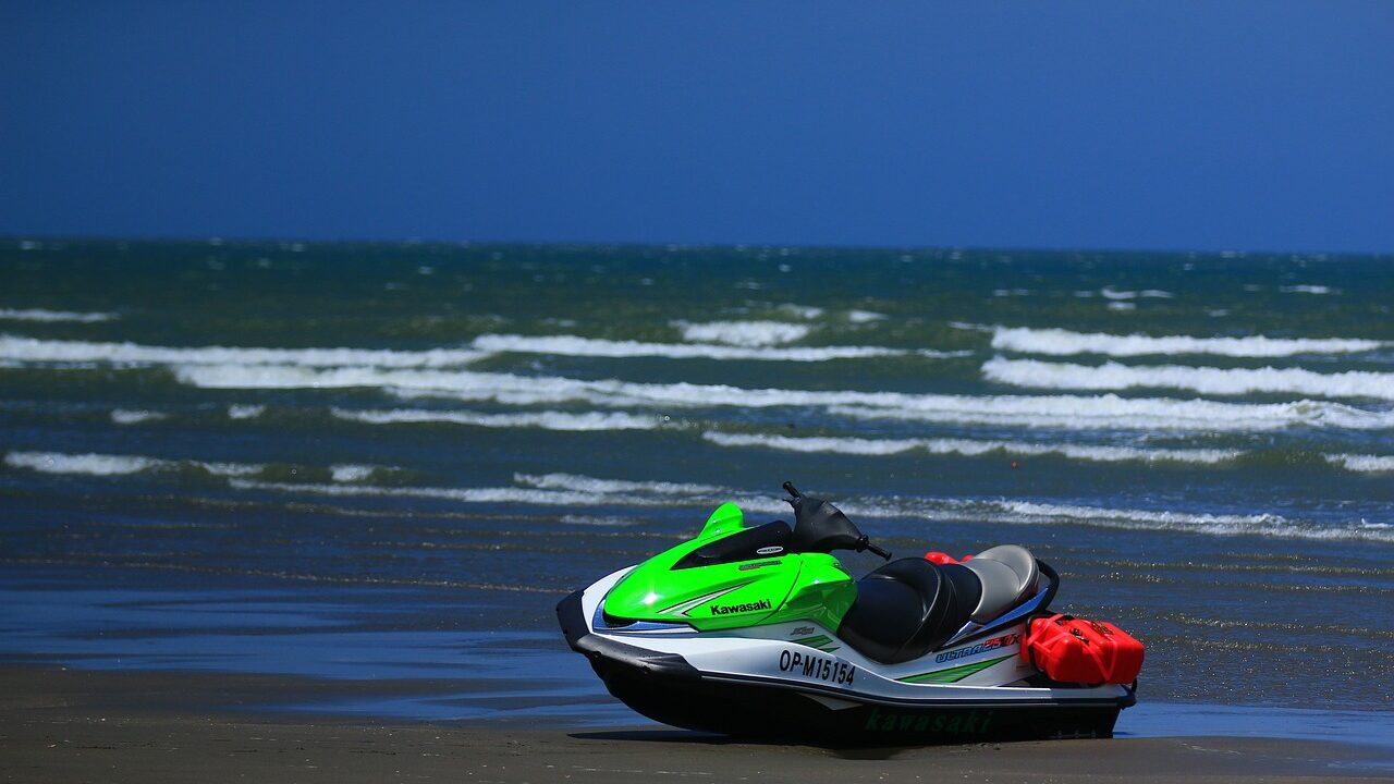 blue sky, sandy beach, jetski-1550200.jpg